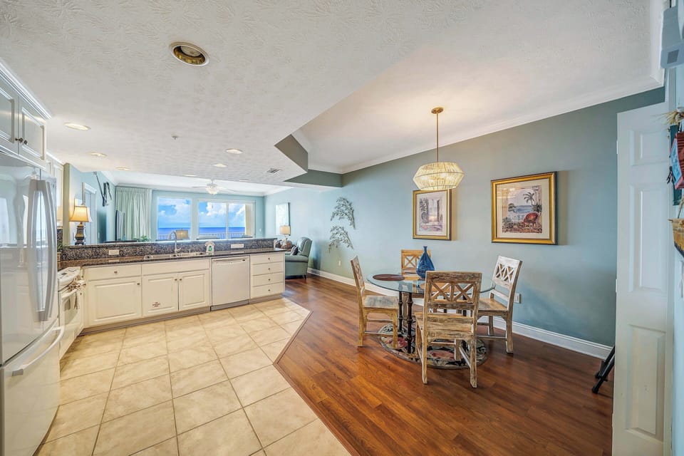 The fully equipped kitchen features granite countertops and everything you need to prepare meals for family & friends.