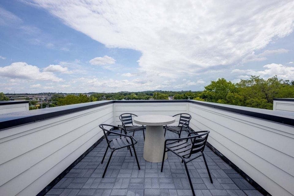 Private rooftop deck with comfortable seating and beautiful views