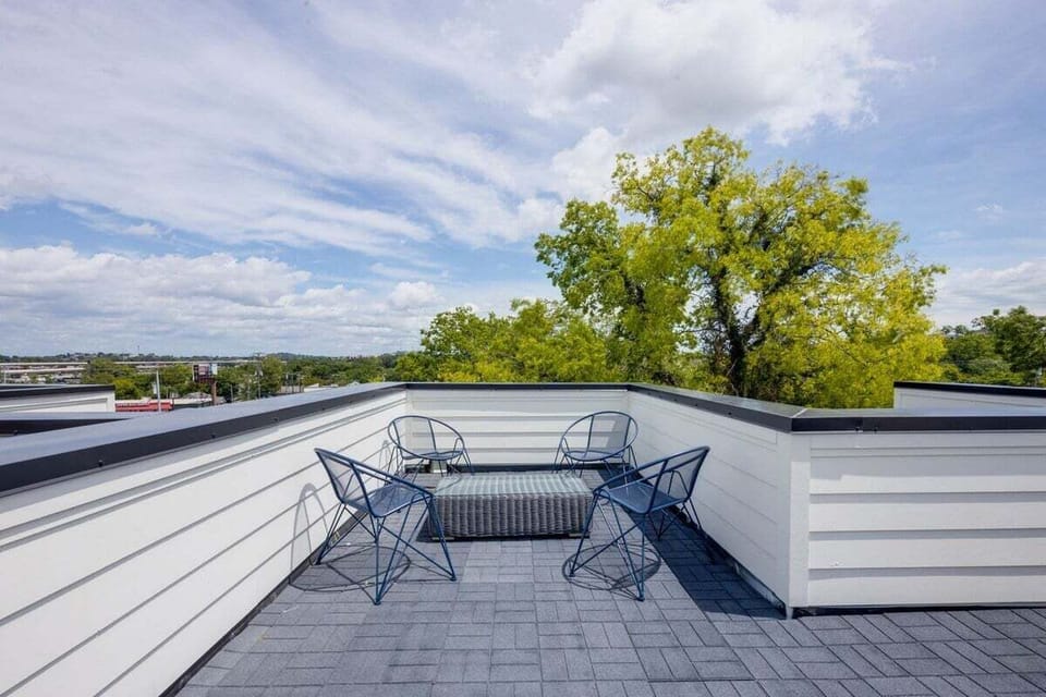 Private rooftop deck with comfortable seating and beautiful views