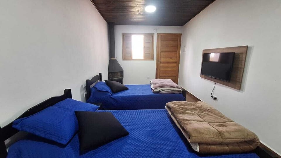 Deluxe Quadruple Room, 1 Bedroom, Balcony, Mountain View | Premium bedding, pillowtop beds, individually decorated