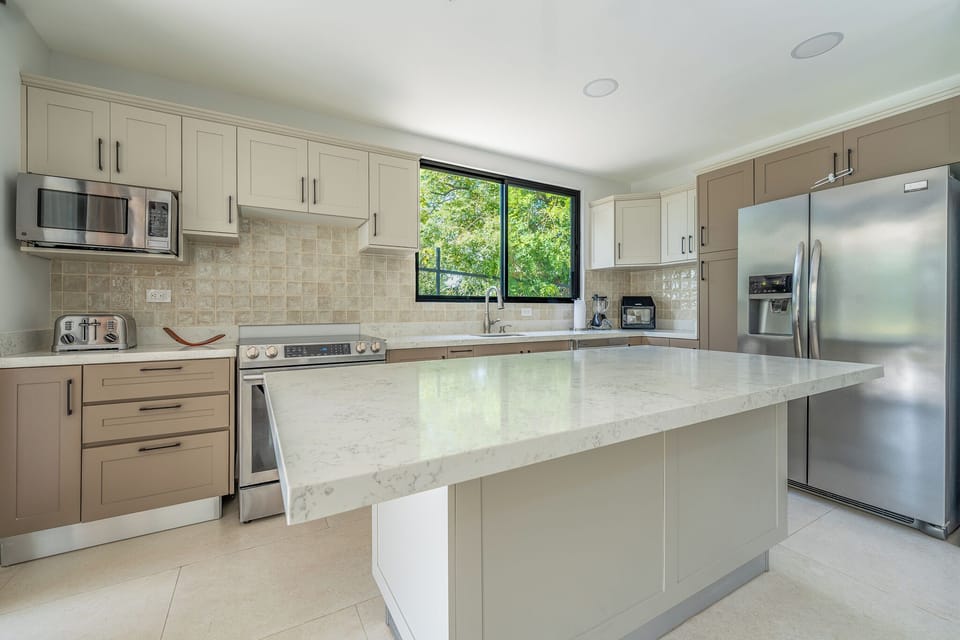 Quartz countertops, all stainless-steel appliances. 