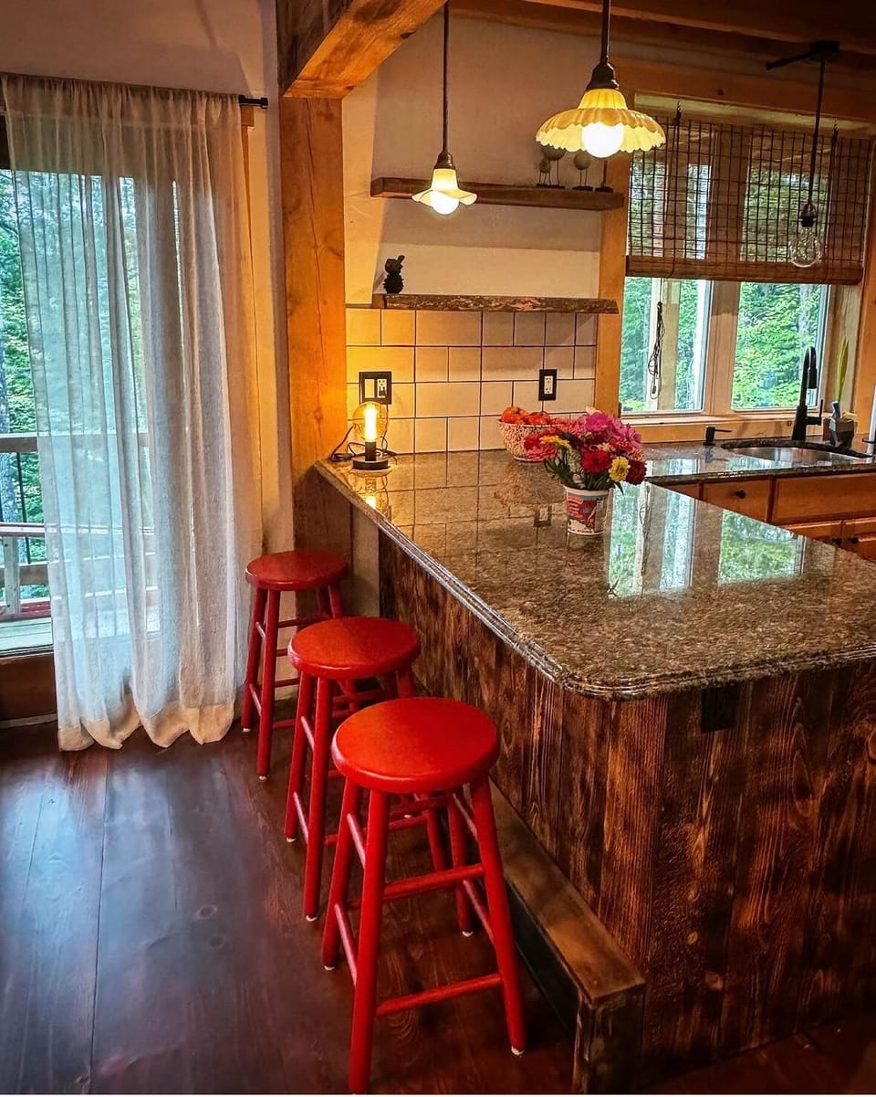 Kitchen counter with stools.