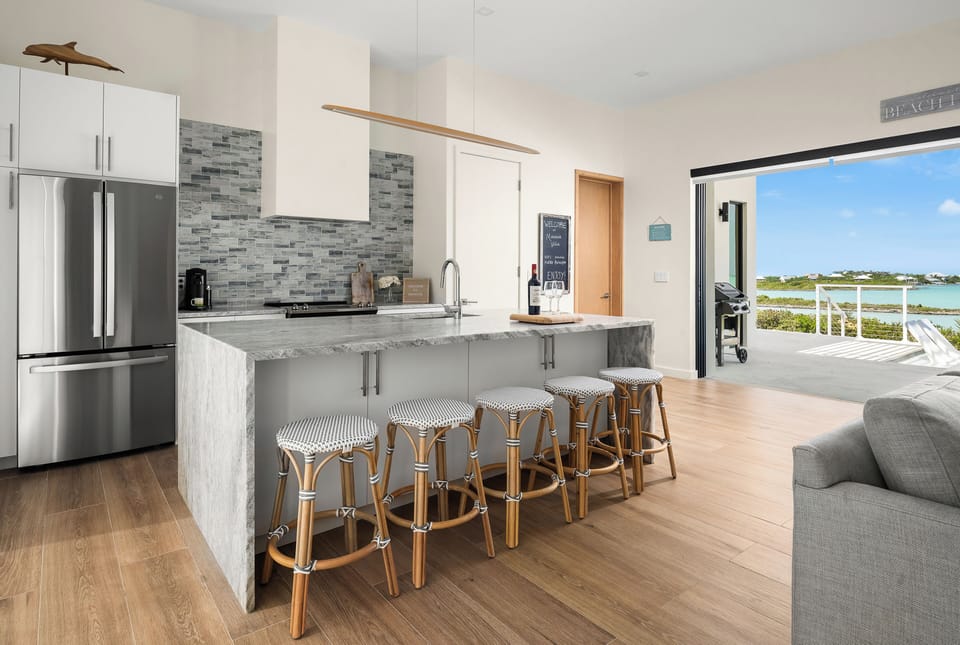 Fully Stocked Kitchen and Dining Bar