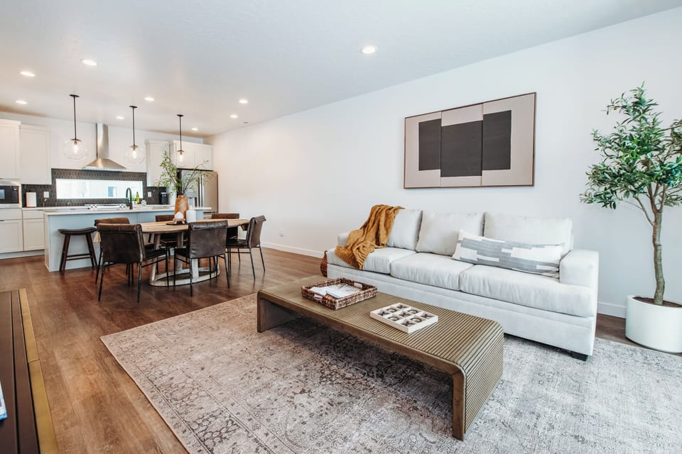 Spacious living room with queen sofa bed for movie nights.