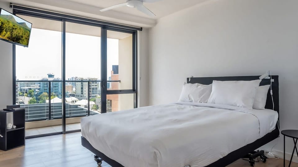 Bedroom 1 with access to a balcony