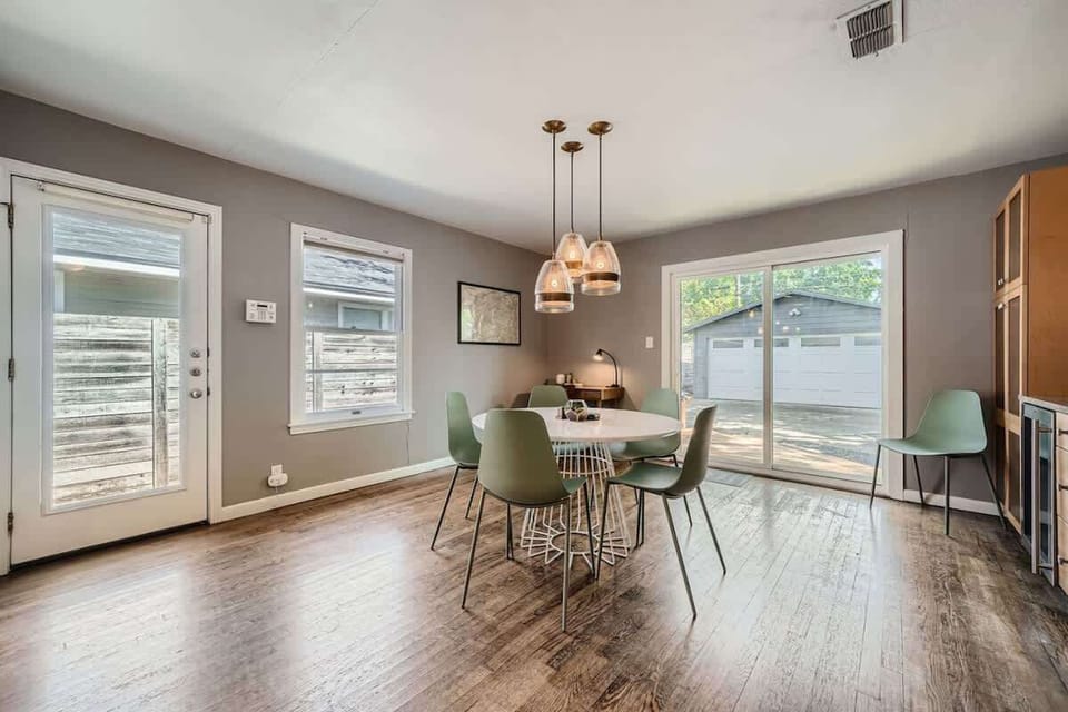 Sleek and modern dining area with minimalist decor and a welcoming atmosphere.