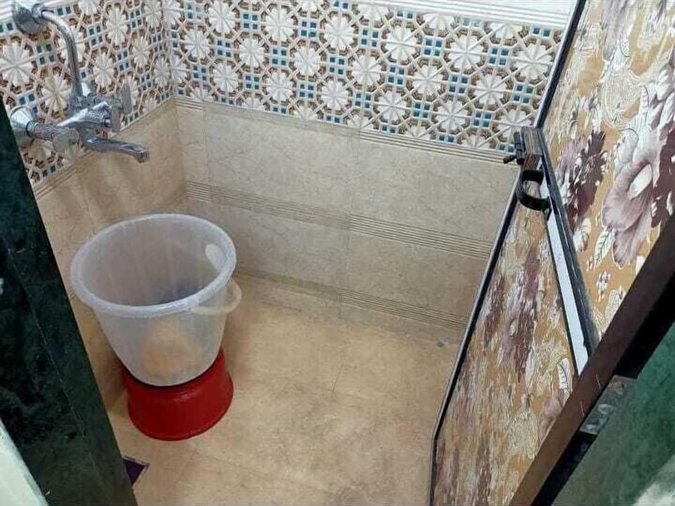 Economy Shared Dormitory | Bathroom | Shower, slippers, towels