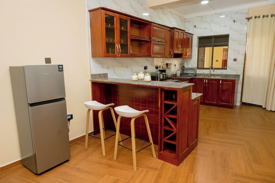 Deluxe Apartment, City View | Private kitchen | Fridge, microwave, oven, stovetop