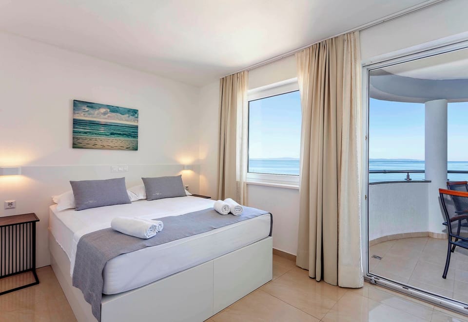 Quadruple Room, Balcony, Sea View | Blackout drapes, iron/ironing board, free WiFi, bed sheets