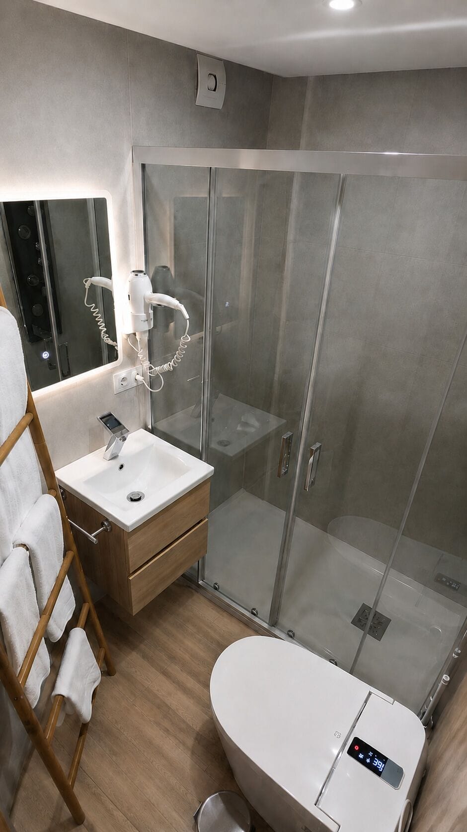 Shower, eco-friendly toiletries, hair dryer, towels