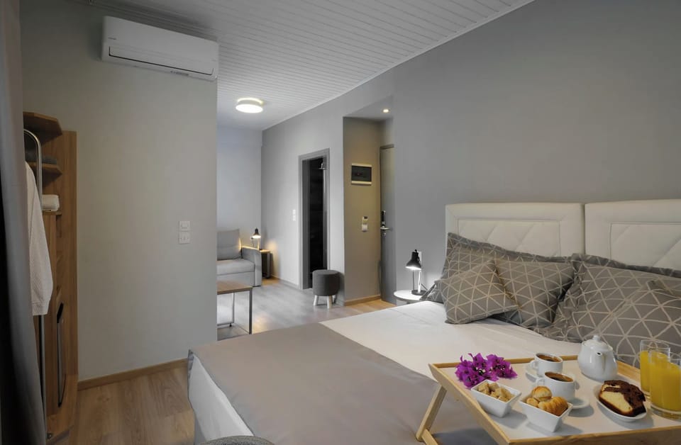Deluxe Double or Twin Room, Balcony | In-room safe, iron/ironing board, free WiFi
