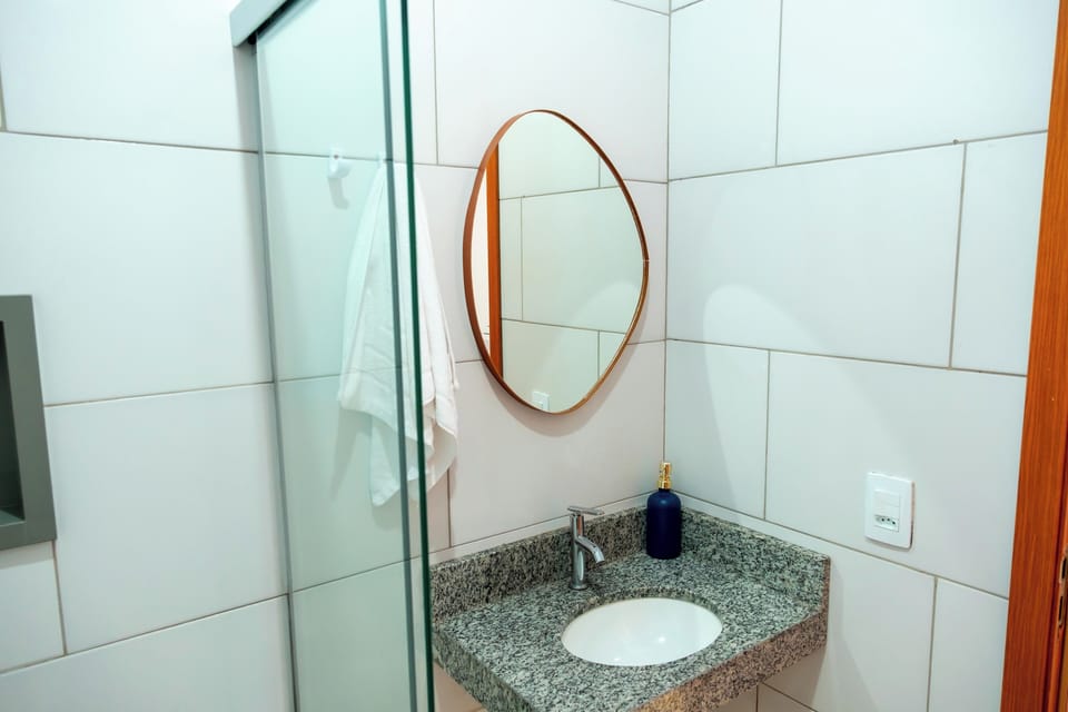 Shower, towels, soap, toilet paper