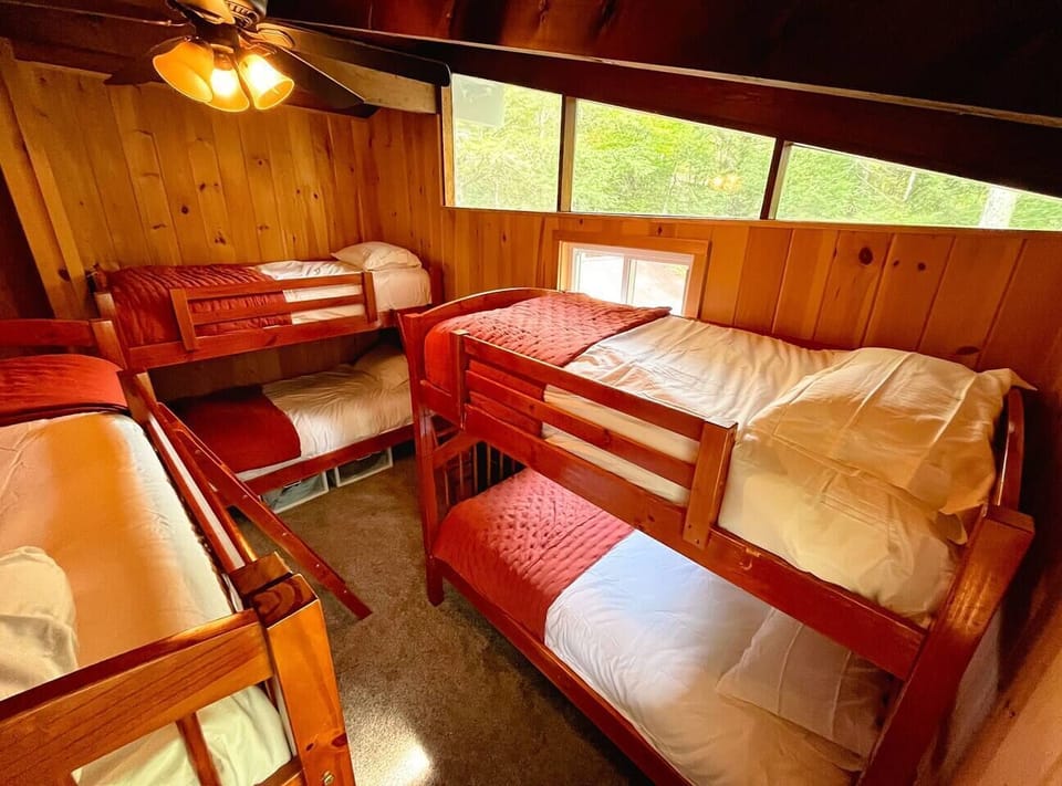 Bunk room with twin over full bed – great for kids, families, and group stays.