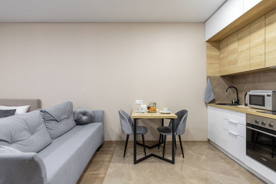 Classic Apartment, Park View | Living area | TV