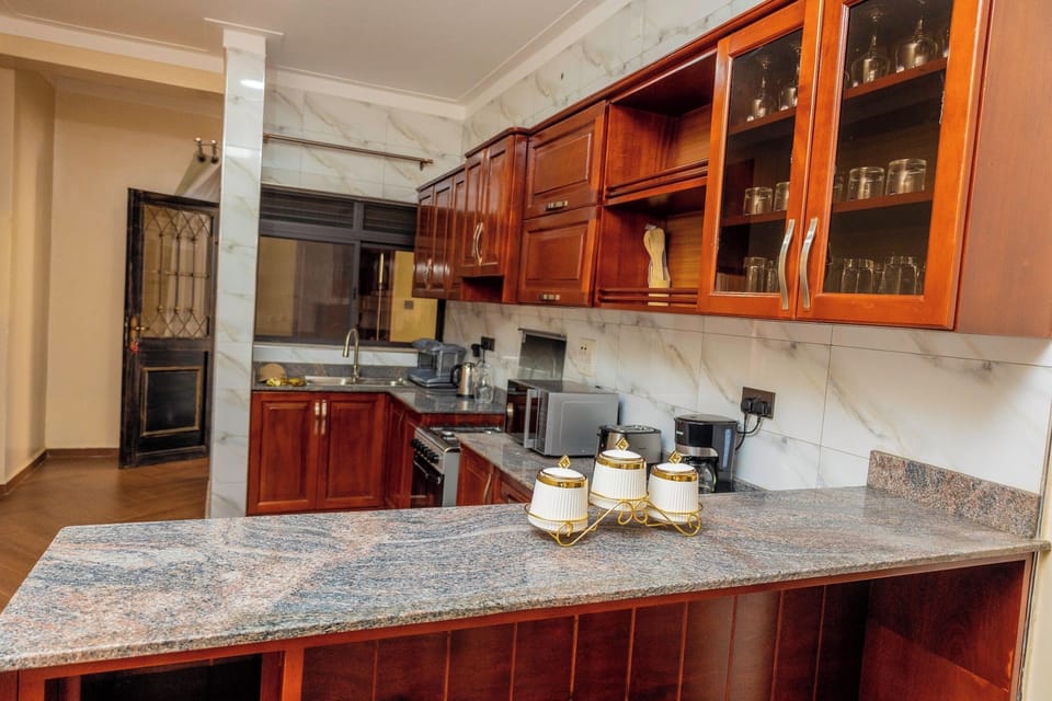 Economy Apartment, City View | Private kitchen | Microwave, oven, stovetop, cookware/dishes/utensils