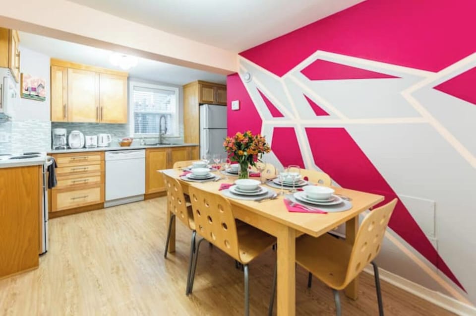 Back of the house features a bright window and well-equipped kitchen