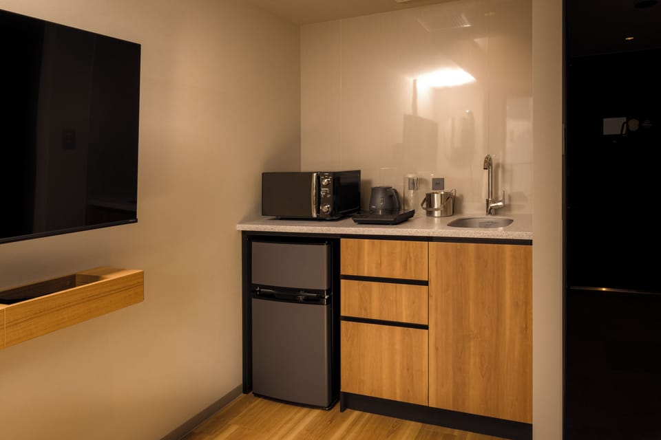 Superior Terrace Triple Bunk Bed Room, Non Smoking | Private kitchen | Fridge, microwave
