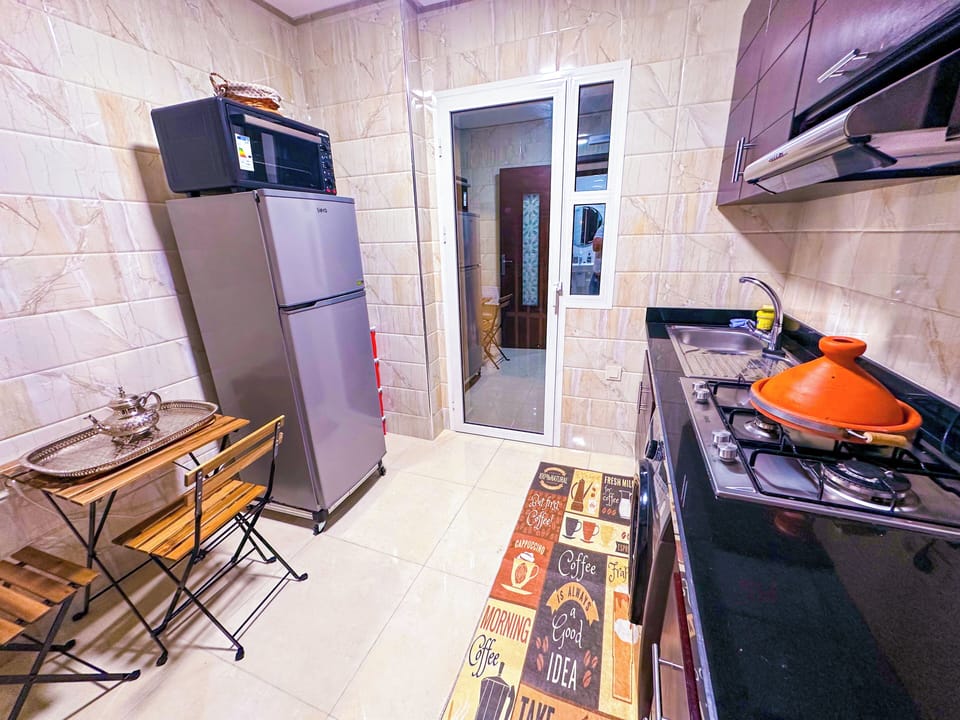 Luxury Apartment, Garden View | Private kitchen | Full-size fridge, oven, electric kettle, toaster