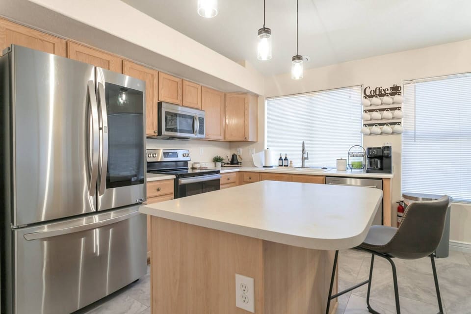 Kitchen with all the necessities to cook meals and an upgraded fridge