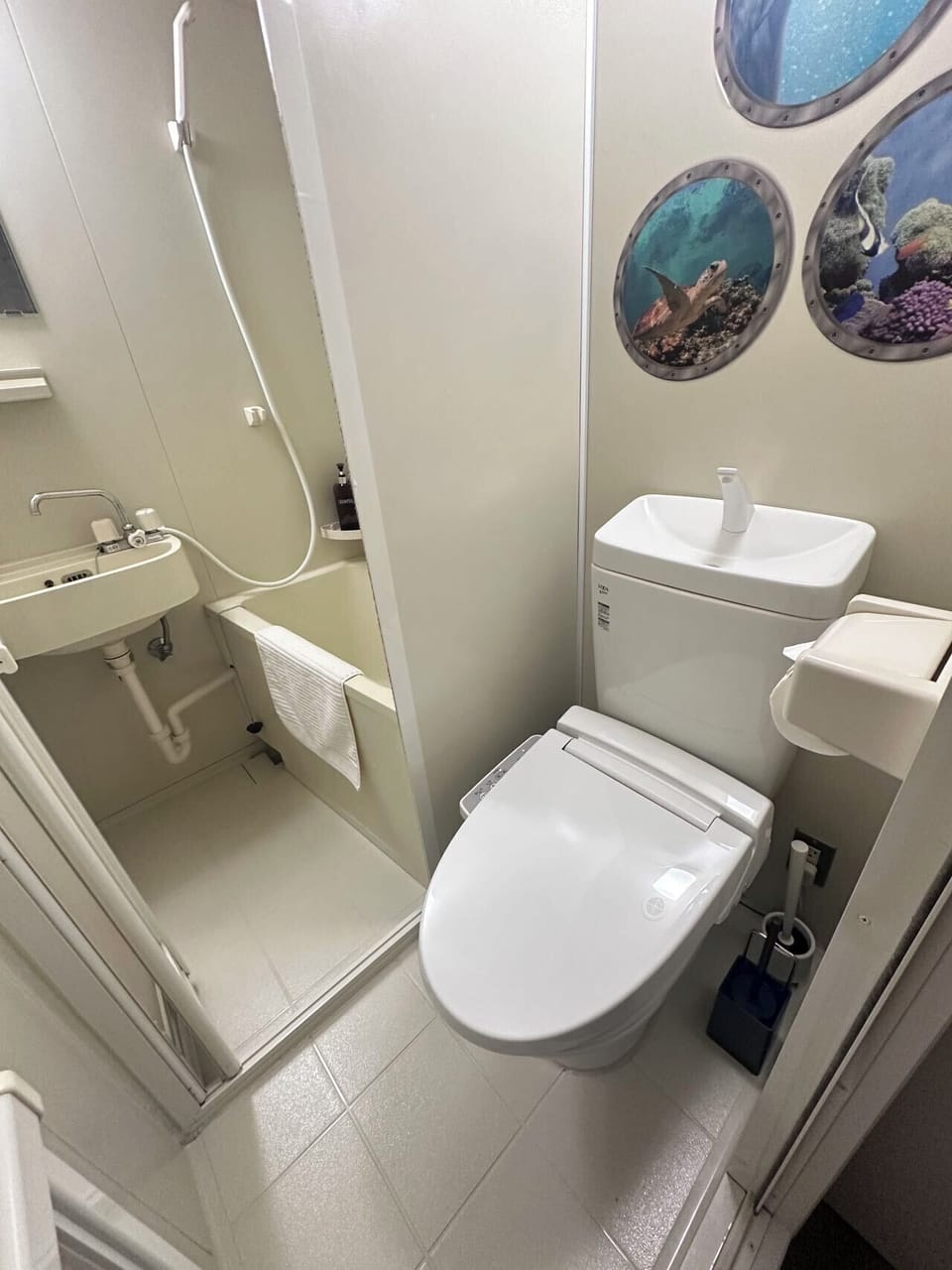 Combined shower/tub, free toiletries, hair dryer, slippers