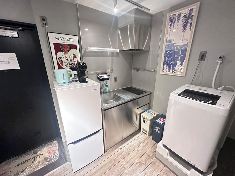 Comfort Condo | Private kitchen | Fridge, stovetop, electric kettle, cookware/dishes/utensils