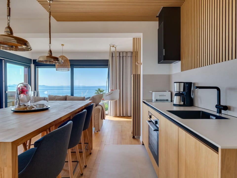 Countertop, Cabinetry, Property, Kitchen Sink, Sink, Kitchen, Wood, Interior Design, Kitchen Appliance, Lighting