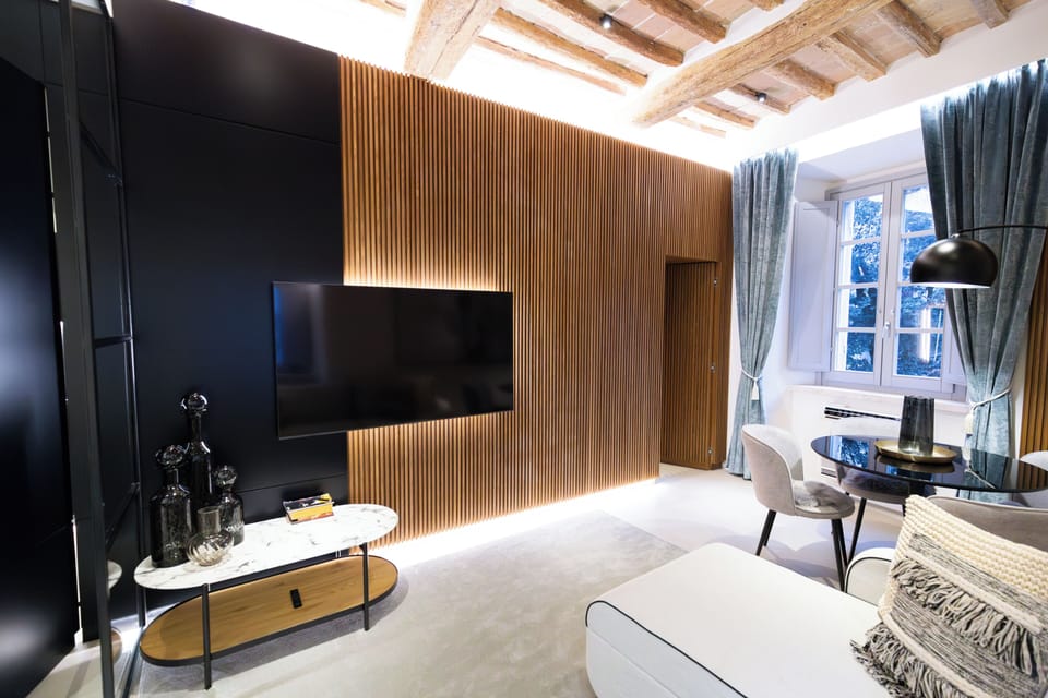 Luxury Condo, City View | Living area | Flat-screen TV