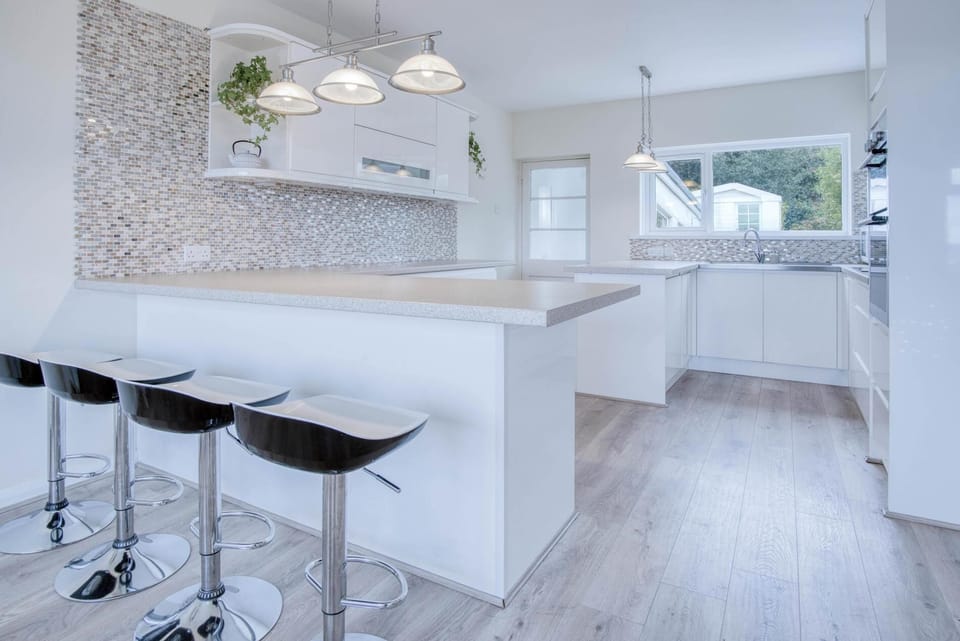 Microwave, oven, electric kettle, dining tables
