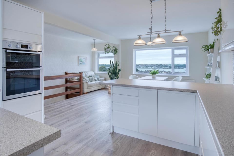 Microwave, oven, electric kettle, dining tables
