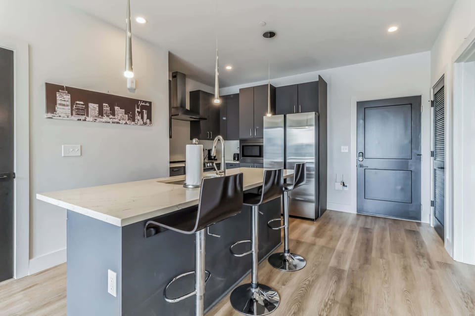 Sip morning coffee or grab a bite at the kitchen counter, seating 3
