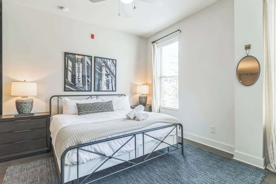 Recharge in the stylish bedroom retreat, featuring a plush king bed