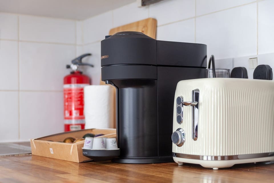 Apartment | Private kitchen | Coffee/tea maker, dining tables