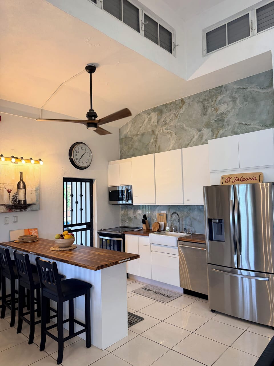 Full kitchen with electric stove, oven, dishwasher, full fridge, lots of storage