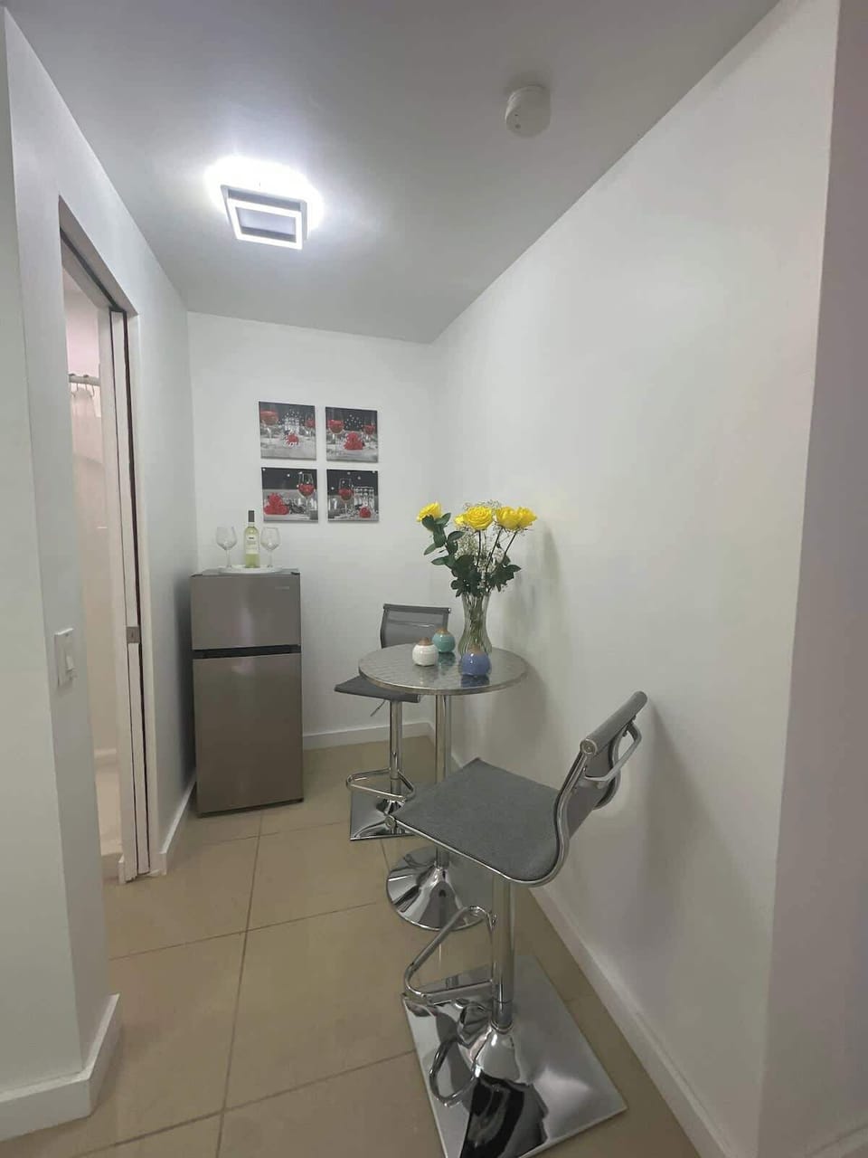 Intimate indoor dining area, ideal for enjoying a meal with a touch of home.