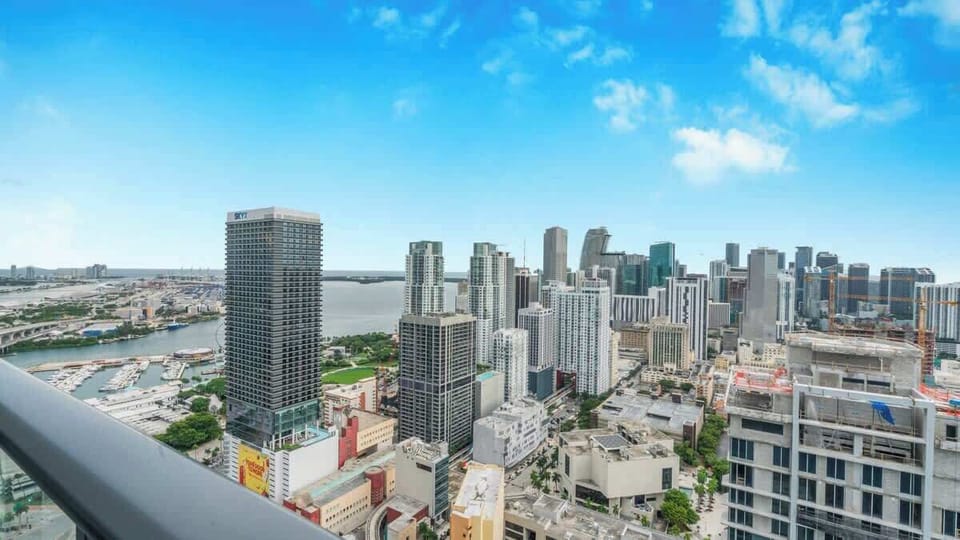 Sip your morning coffee with a view – This balcony offers breathtaking cityscapes.