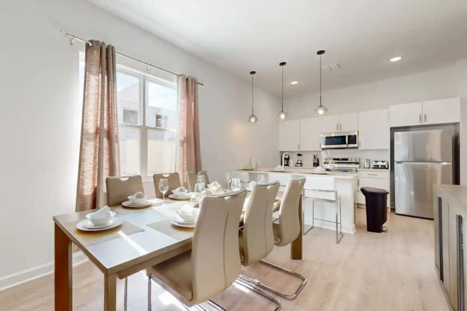 Gather around the large dining table for memorable meals together.