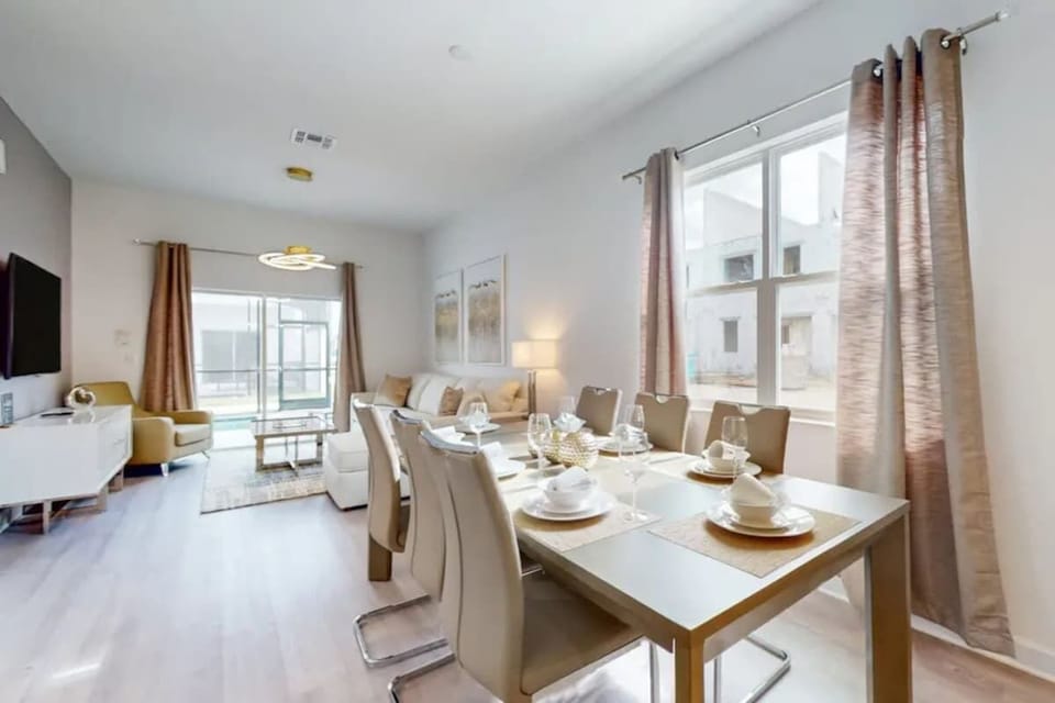 Gather around the large dining table for memorable meals together.
