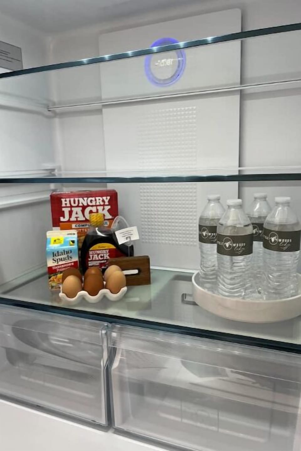 Chilled water and breakfast: Pancakes, Hashbrowns, syrup & farm fresh eggs!