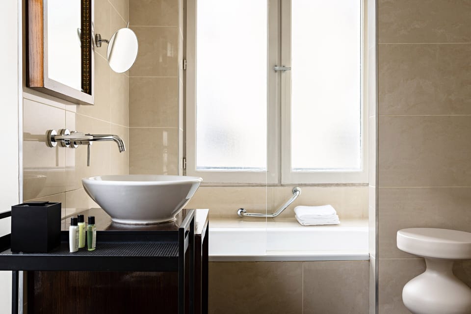 Rainfall showerhead, free toiletries, hair dryer, towels