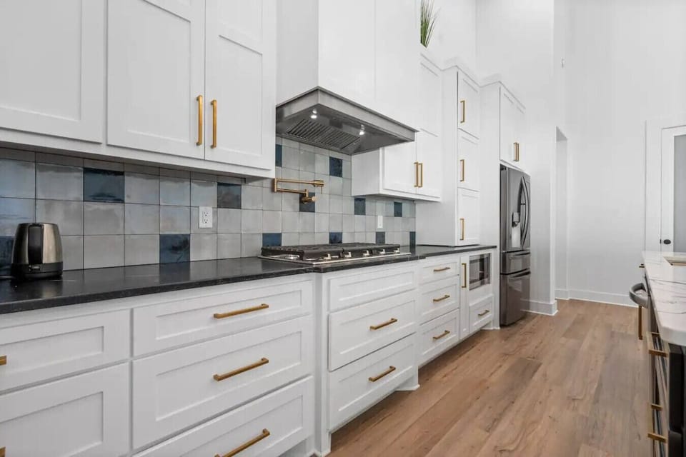 Upgraded kitchen with fully stocked cooking essentials.