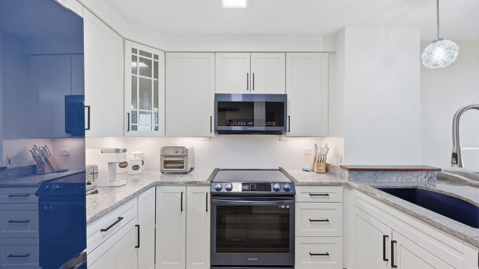 Modern kitchen with everything needed for your stay.