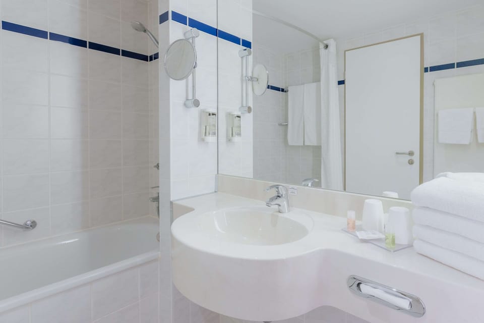 Deep soaking tub, eco-friendly toiletries, hair dryer, towels