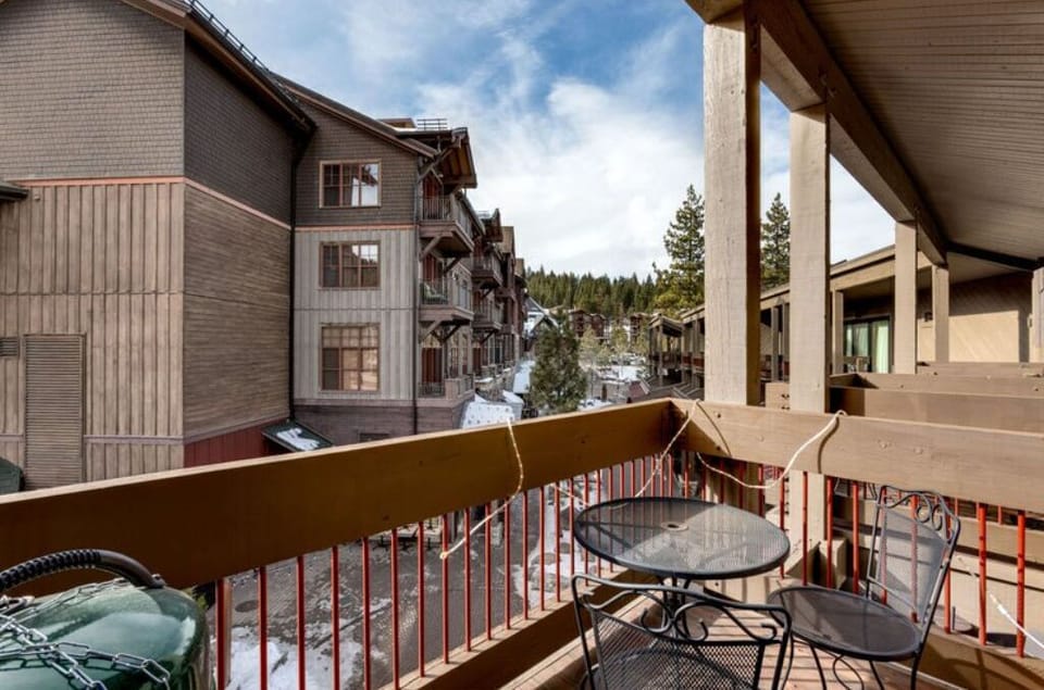 Step out onto the private balcony to take in picturesque views and enjoy the fresh mountain air.