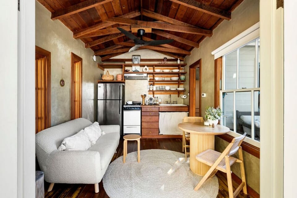 Bright and open kitchen and living room, designed for a clean, cozy, and relaxing stay.