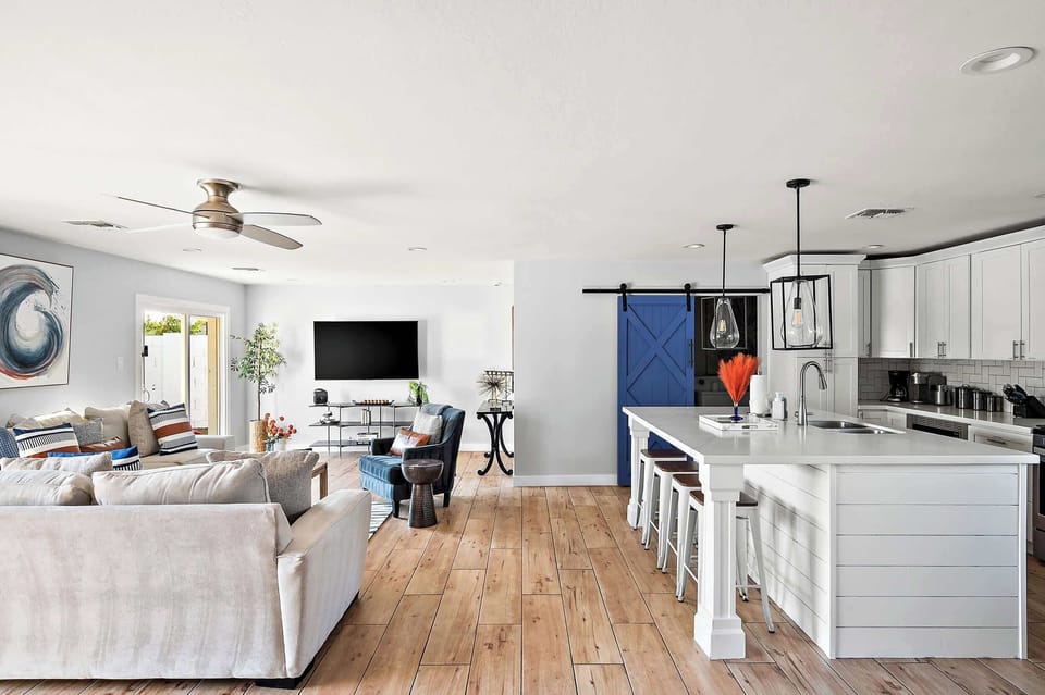 Embrace the beauty of open living! Our spacious floor plan seamlessly connects the living room, dining area, and kitchen