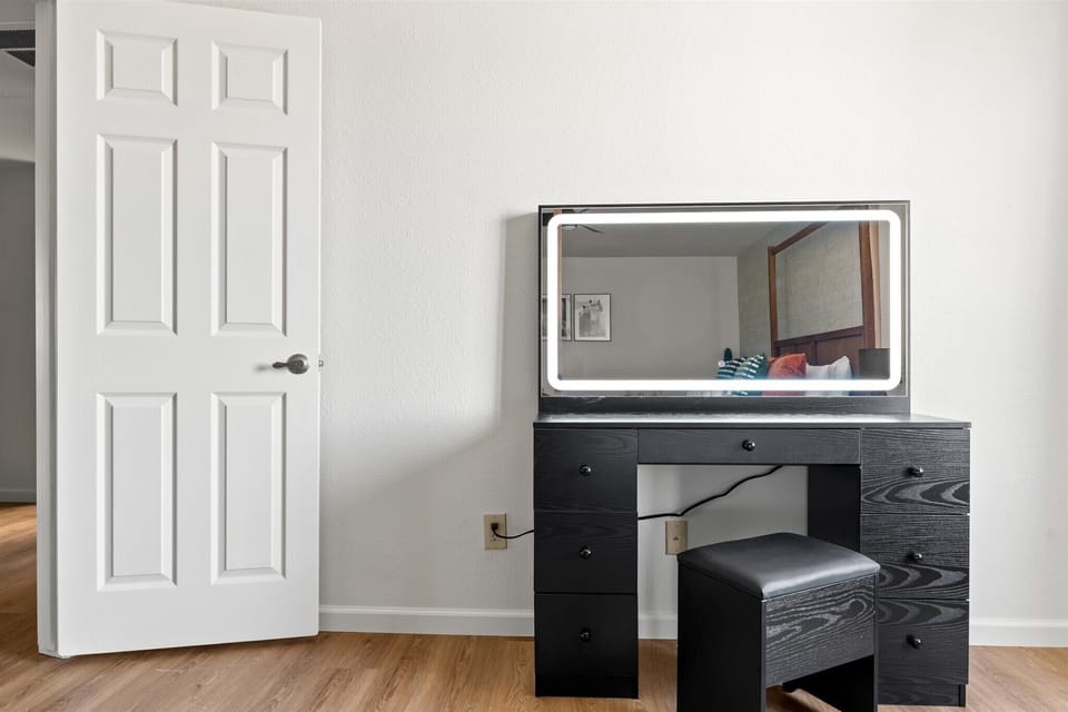 A perfect blend of elegance and simplicity! Discover our sleek vanity area for all your beauty needs.