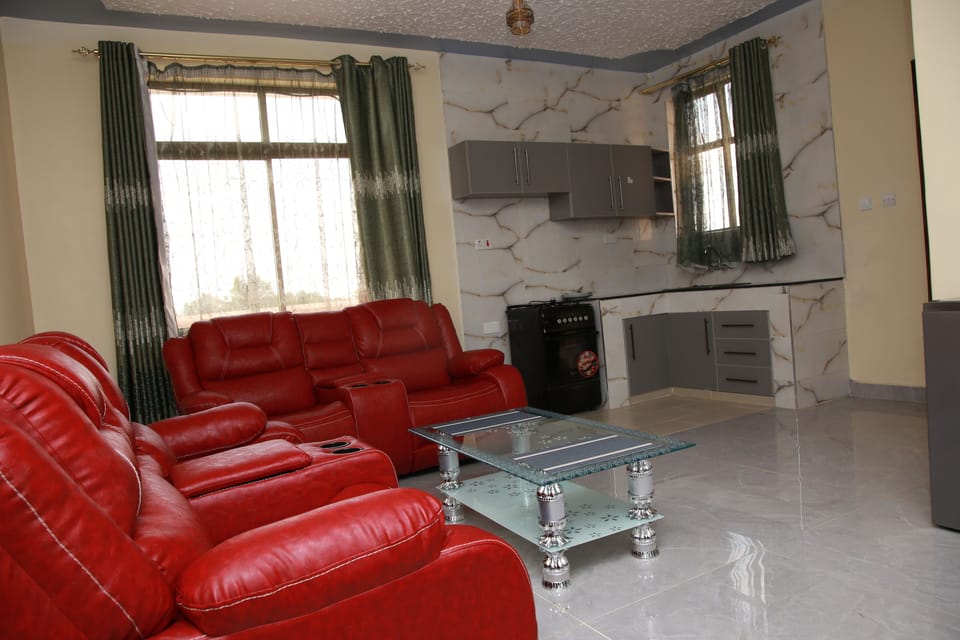 Twin Room, Balcony, Garden View | Living area | TV