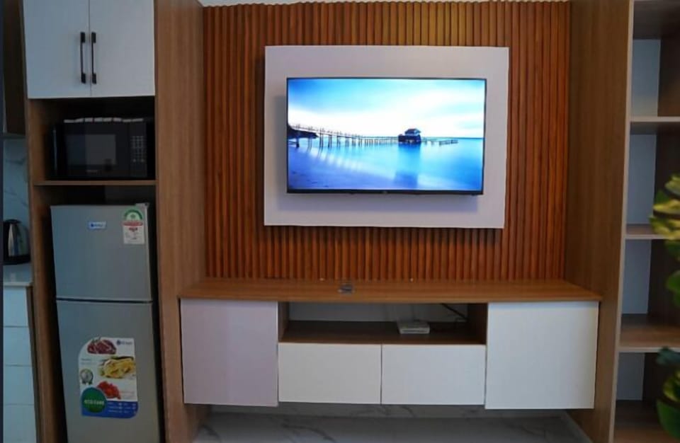 Classic Apartment | Living area | 55-inch Smart TV with cable channels, Netflix, streaming services