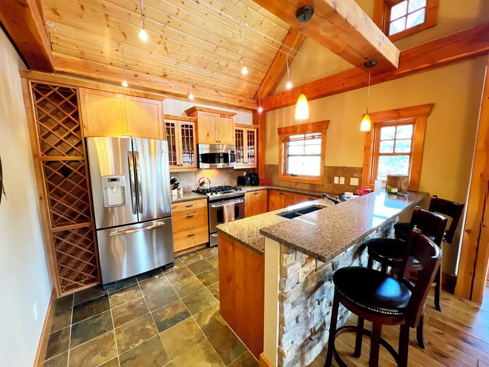 High quality appliances and the kitchen is packed with everything you need to feed the crew.