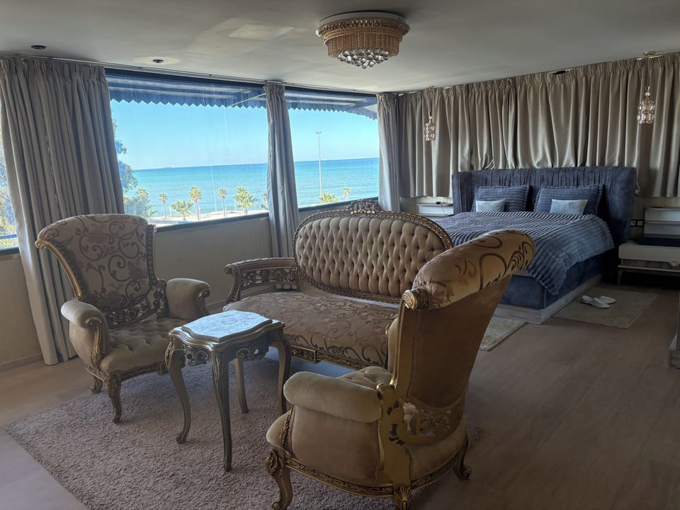 Luxury Suite | In-room safe, desk, laptop workspace, iron/ironing board